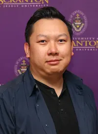 A headshot of an individual.