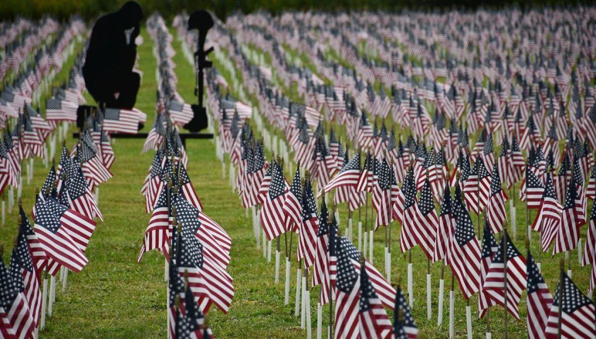 Under a vivid blue sky, a Pennsylvania field whispers the names of the fallen