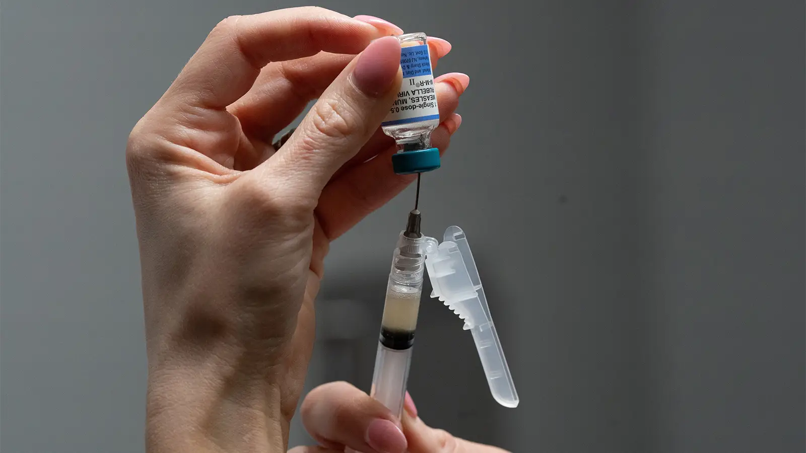 A photo of a nurse preparing an MMR vaccine dose for a patient at a pediatrics clinic in Easley, South Carolina.