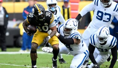 Oct 11, 2026; Pittsburgh, Pennsylvania, USA; Pittsburgh Steelers running back Jaylen Warren (30) is tackled by Indianapolis Colts defensive tackle Jerry Tillery (94) in the second quarter at Acrisure Stadium.