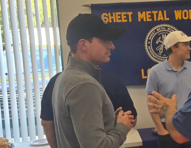 U.S. Rep. Rob Bresnahan Jr., R-8, Dallas Twp., meets with members of trades unions at a Northeast Pennsylvania Building & Construction Trades Council meeting on Friday in Wilkes-Barre. (Michael P. Buffer)