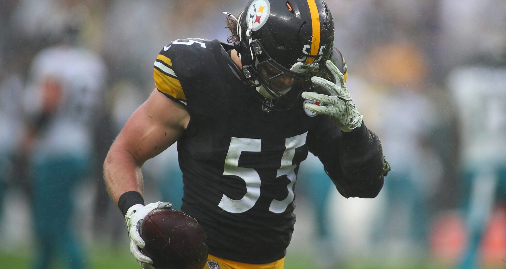 Pittsburgh Steelers Cole Holcomb pulls dirt out of his helmet after recovering a fumble during the first half against the Jacksonville Jaguars at Acrisure Stadium in Pittsburgh, PA on October 29, 2023.