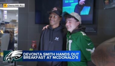Philadelphia Eagles WR DeVonta Smith hands out breakfast at McDonald's in Cherry Hill, New Jersey
