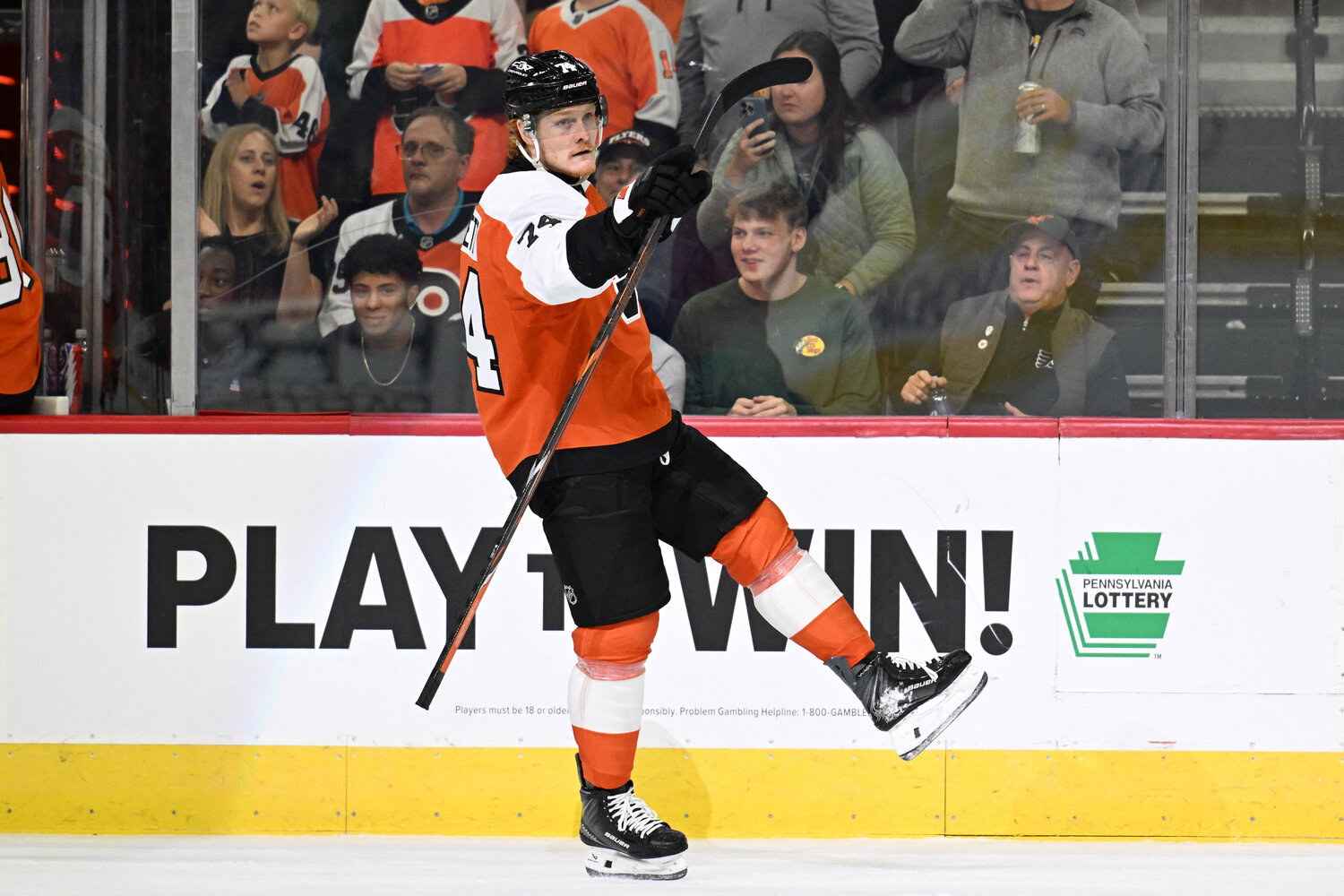 Oct 3, 2026; Philadelphia, Pennsylvania, USA; Philadelphia Flyers right wing Owen Tippett (74) celebrates his goal against the Carolina Hurricanes during the first period at Xfinity Mobile Arena.