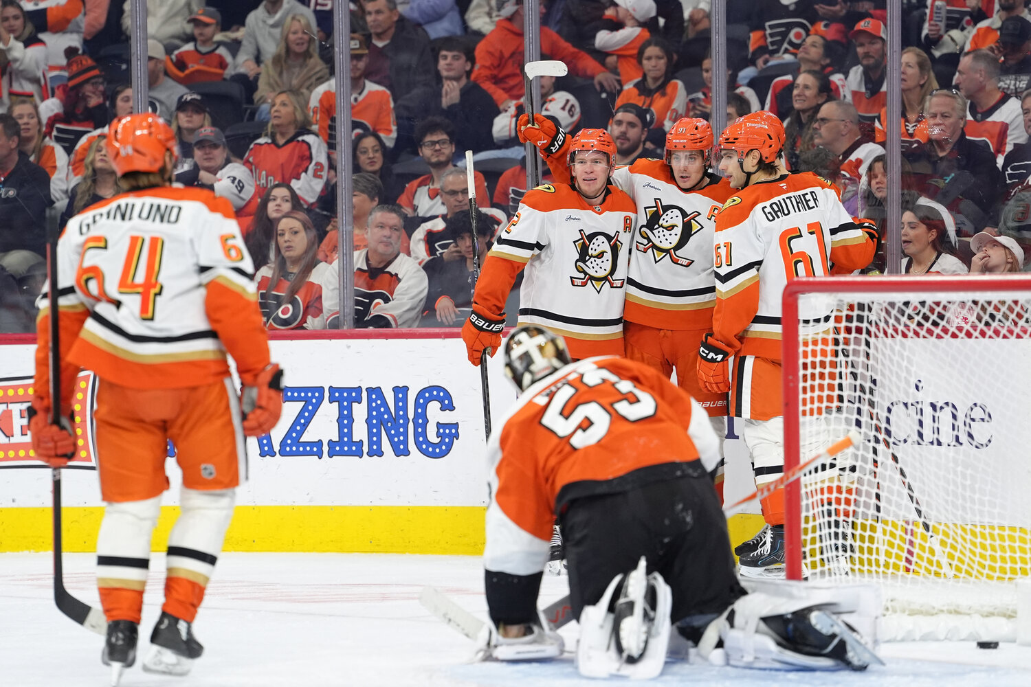 Oct 24, 2026; Philadelphia, Pennsylvania, USA; Anaheim Ducks right wing Beckett Sennecke (45) celebrates with teammates after scoring a goal against the Philadelphia Flyers in the third period at Xfinity Mobile Arena.