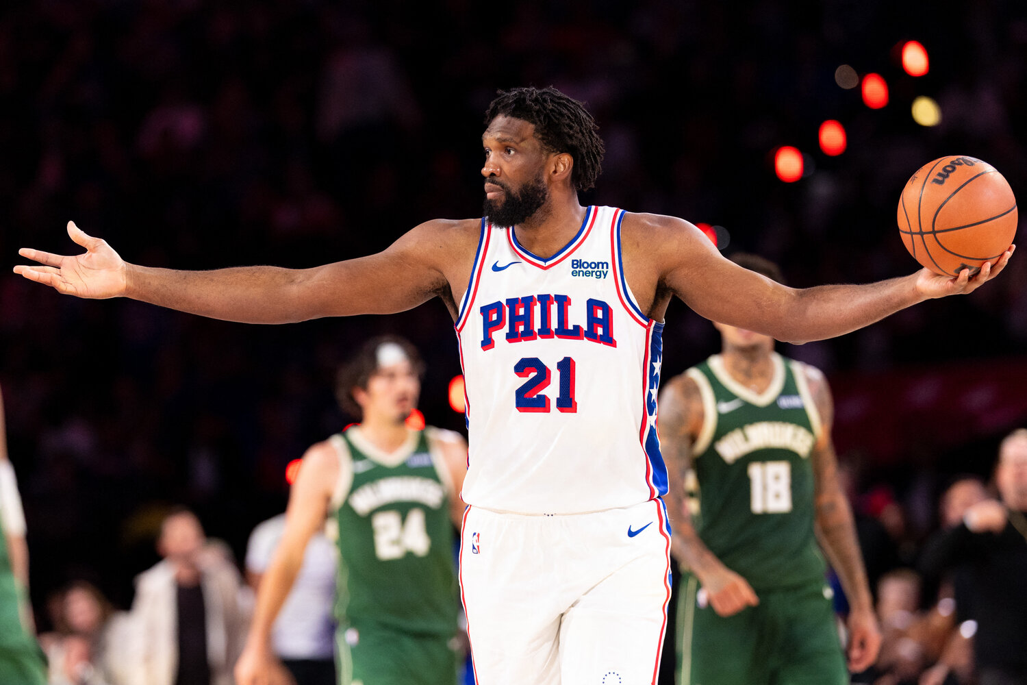 Philadelphia 76ers center Joel Embiid (21) reacts after a play against the Milwaukee Bucks during the fourth quarter at Xfinity Mobile Arena.