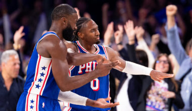 Philadelphia 76ers guard Tyrese Maxey (0) reacts alongside guard Jaylen Brown (7) after his three pointer against the Cleveland Cavaliers during the third quarter at Xfinity Mobile Arena.
