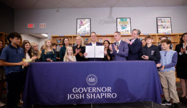 Gov. Josh Shapiro signs Senate Bill 1014 into law at Lenape Middle School in Doylestown, Bucks County on Monday, Oct. 26, 2026.