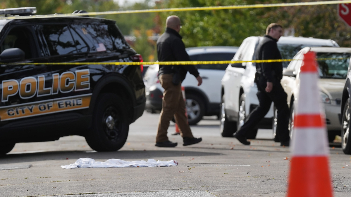 Erie Bureau of Police investigate the scene where multiple people were killed in a reported shooting in and around a home at 722 Perry St. in Erie, Pa., Oct. 9, 2026. Erie Bureau of Police investigate the scene where multiple people were killed in a reported shooting in and around a home at 722 Perry St. in Erie, Pa., Oct. 9, 2026.