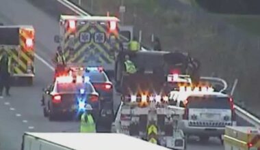 A vehicle turned on its side on the Parkway West