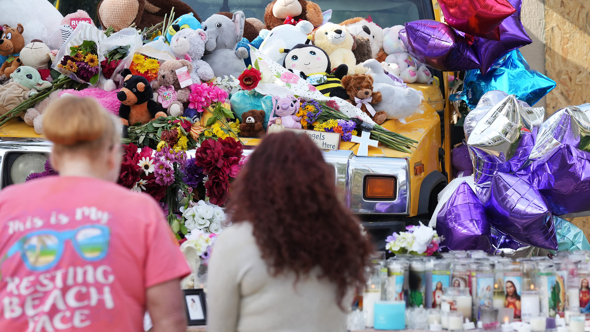 A memorial of stuffed animals and candles is shown at 722 Perry St. in Erie, Pa., Oct. 12, 2026, three days after a mass shooting there left 10 people dead, including the gunman, who shot himself. Here, the author says Erie must commit to ensuring the dignity of every human person.