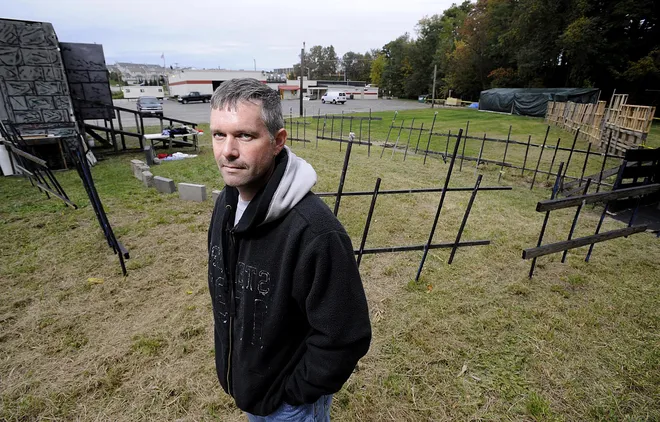 Brian Haven was photographed Oct. 8, 2009, near the outside features of Valley of the Ghouls haunted house at the Belle Valley Fire Department in Millcreek Township. Haven is an associate member of the fire department and creator of the haunted house. He said the haunted house had to be partially rebuilt after suffering major water damage when the fire department's property was flooded during a heavy rain storm on June 30. CHRISTOPHER MILLETTE/
