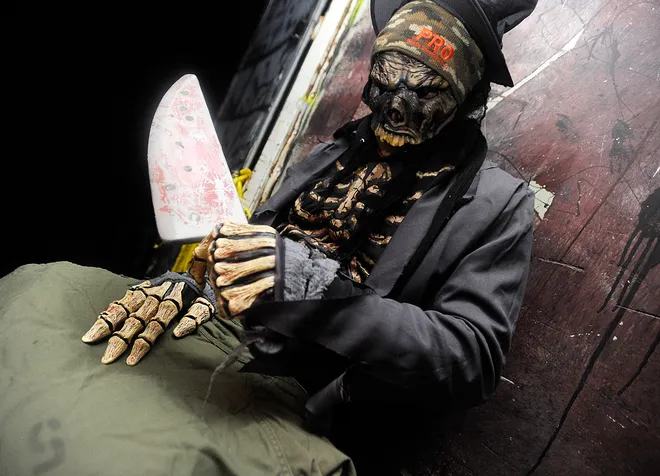 Tom Krahnke Jr., of Erie, works at the Valley of the Ghouls haunted house behind the Belle Valley Fire Department in Millcreek Township on Oct. 15, 2011. JANET B. KUMMERER/