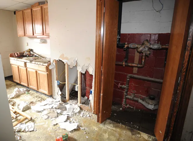 In this July 1, 2009, file photo, a room inside the Belle Valley Fire Department is shown after receiving extensive damage from being flooded when Mill Creek over flowed its banks after heavy rains fell.