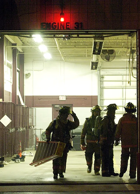 Firefighters work at Belle Valley Fire Department where there was a report of a fire on Monday, June 13, 2005.