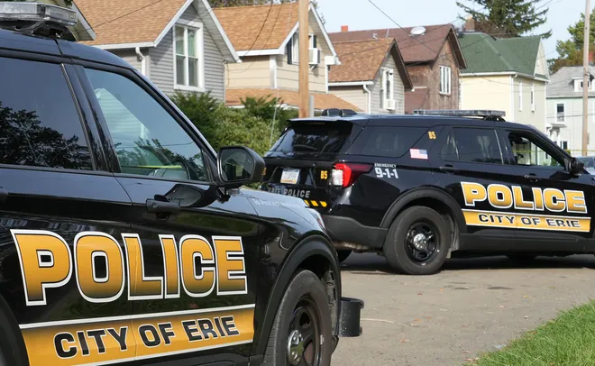 Erie Bureau of Police investigate the scene where nine people died in a reported shooting in and around a home at 722 Perry St. in Erie, Pa., Oct. 9, 2026.