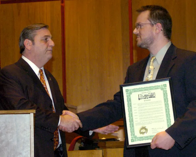 Erie County Executive Mark DiVecchio, left, recognizes Corry High School teacher Craig Dean, coach of the Corry Area High School Honors Problems of Democracy Class, at the Erie County Courthouse on March 4, 2008. The class finished first in the state in the "We the People: The Citizen and the Constitution" competition on Jan. 10 in Valley Forge. The win gave Corry's team the right to represent their school and the state of Pennsylvania at the national competition in Washington, D.C. It was the third year in a row that the Corry team won the state competition.