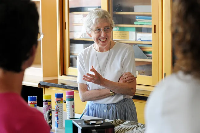 Former St. Benedict's Academy student and teacher Sister Mary Louis Eichenlaub shares stories with former students Cheryl Zukowski, left, and Maricarol Schoenfeldt, right, at the St. Benedict Education Center on June 9, 2008.