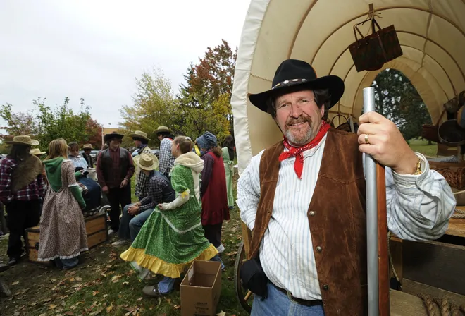 Bob Henninger, right, 10th-grade U.S. and world history teacher at McDowell Intermediate school, takes teaching to the next level Oct. 24, 2008, by recreating life on the prairie for his class.