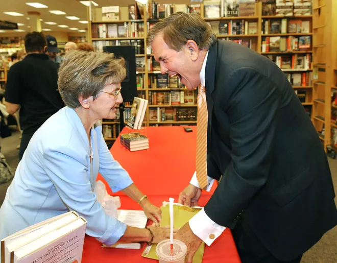 Former Pennsylvania Governor and Director of Homeland Security Tom Ridge is greeted by Sister Mary Helen Forney, SSJ, as he prepares to sign books for the crowd gathered to hear him speak at Borders Bookstore in Millcreek Township on Sept. 16, 2009. Forney was Ridge's fourth-grade teacher at St. Andrews School in 1954. Ridge was on a tour promoting his book "The Test of Our Times."