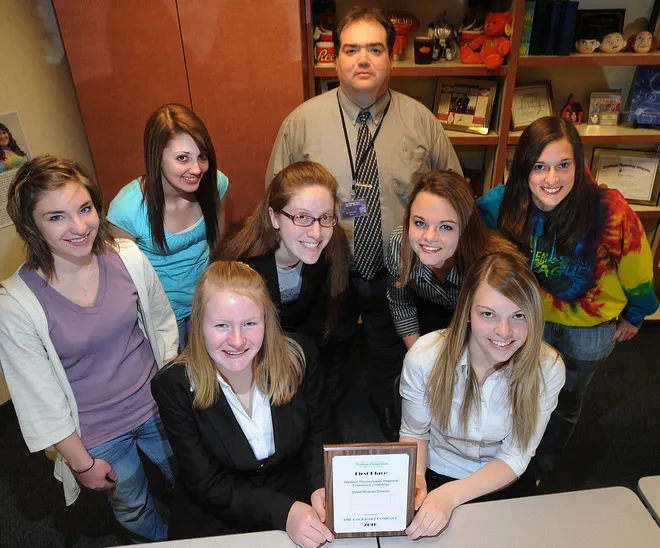 Seneca High School students advanced to a state economics competition in 2010. They were photographed at Seneca High School on March 30. The students are, sitting, Ally Belden, 17, left, Lauren Laska, 17, right. Standing, left to right, Jackie DeCoursey, 18, Brianne Drumm, 18, Liz Ray, 18, economics teacher Robert Hart, Brittany Langer, 17, and Britney Trayer, 18.