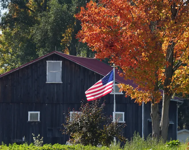 Leaves start to turn color along West Lake Road in Girard Township, Pa., on Oct. 20, 2026.