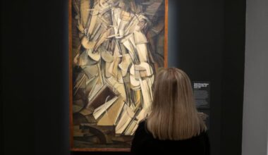 A visitor looks at Marcel Duchamp's "Nude Descending a Staircase (No. 2)" on exhibit at the Philadelphia Museum of Art in Philadelphia on Thursday, Oct. 8, 2026.