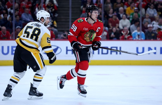 Chicago Blackhawks center Connor Bedard (98) looks down the ice in the first period of a game against the Pittsburgh Penguins at the United Center in Chicago on Oct. 13, 2026. (Chris Sweda/Chicago Tribune)