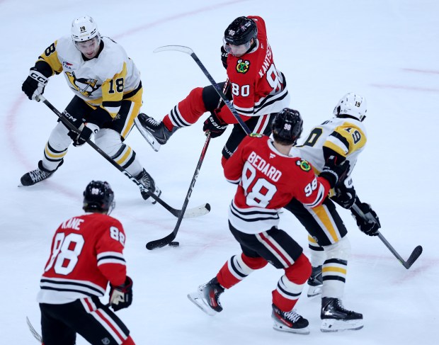 Chicago Blackhawks right wing Roman Kantserov (80) tries to make a play in the second period of a game against the Pittsburgh Penguins at the United Center in Chicago on Oct. 13, 2026. (Chris Sweda/Chicago Tribune)