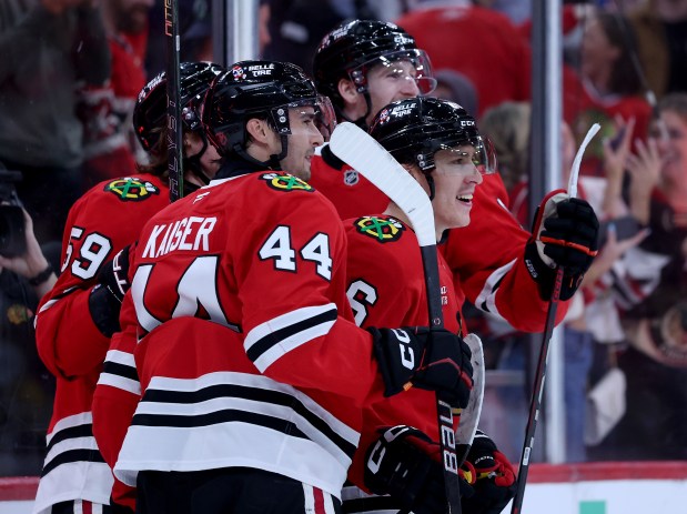 Chicago Blackhawks center Teuvo Teravainen (right) celebrates with his teammates after scoring a goal in the third period of a game against the Pittsburgh Penguins at the United Center in Chicago on Oct. 13, 2026. (Chris Sweda/Chicago Tribune)