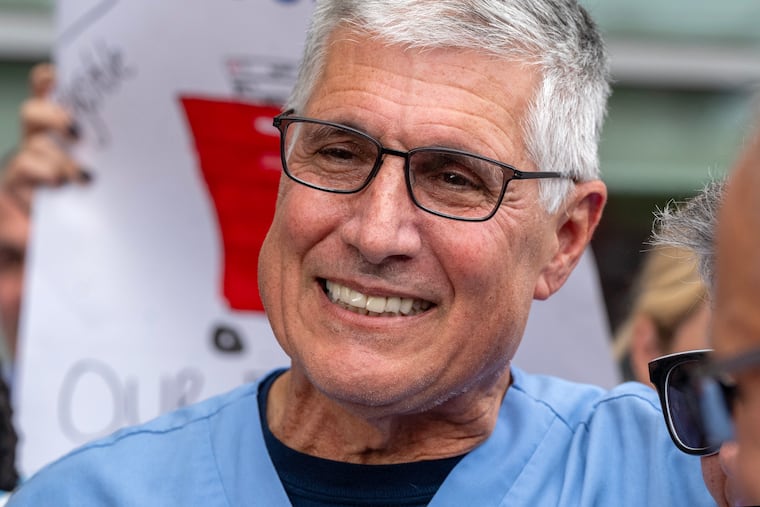 Emergency room doctor Alfred “Al” Sacchetti is greeted by other physicians, nurses, hospital staff, friends, former colleagues, and patients as he finishes his shift at Virtua Our Lady of Lourdes Hospital in Camden on Tuesday.