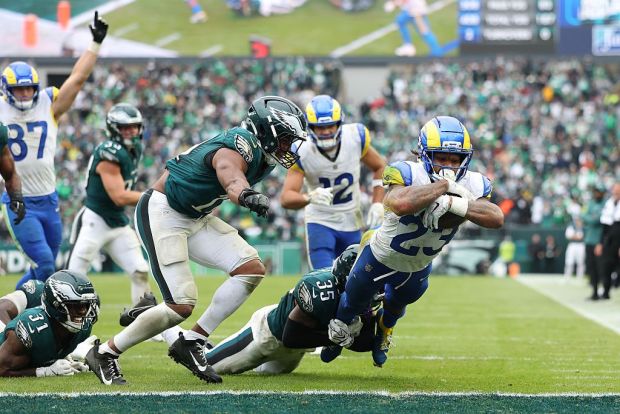 Running back Kyren Williams (23) of the Los Angeles Rams dives into the end zone for a touchdown during the fourth quarter against the Philadelphia Eagles at Lincoln Financial Field on Sunday, Oct. 4, 2026. (Emilee Chinn/Getty Images)