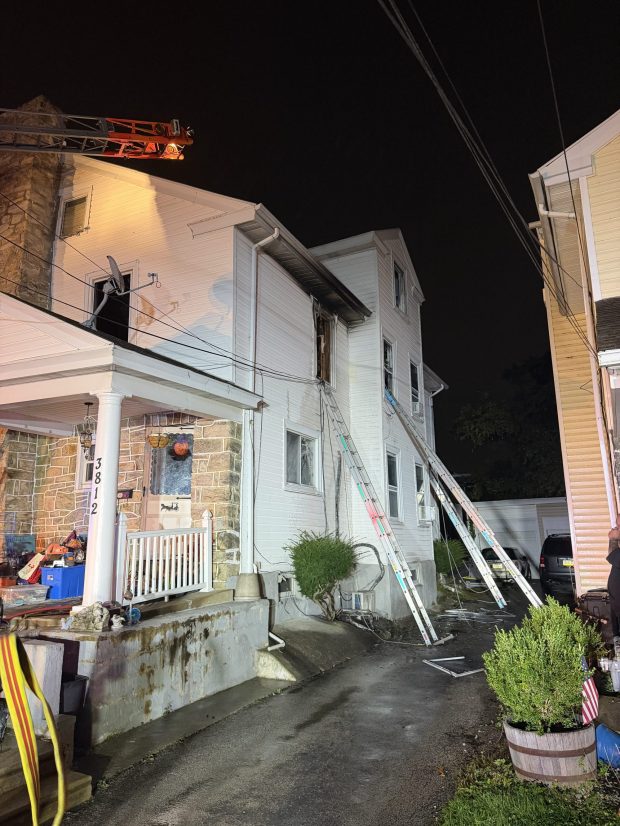 Upper Darby firefighters operate in the 3800 block of Albermarle Avenue Friday morning. (COURTESY UPPER DARBY FIRE DEPARTMENT)