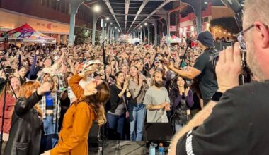 Members of Wheatus play to a crowd of more than 3,000 people outside of Evil Genius Brewing Company on Front Street.