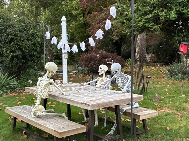 Narberth Borough denizens meet for a ghoulish conversation just days before Halloween. (Photo submitted by Mary Brown)