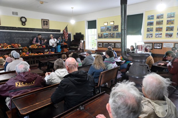 The Mike Hertzog Trio performs in the Freyberger one-room schoolhouse during the Heemet Fescht at the Pennsylvania German Cultural Heritage Center at Kutztown University on Saturday, Sept. 26, 2026. (BILL UHRICH/READING EAGLE)