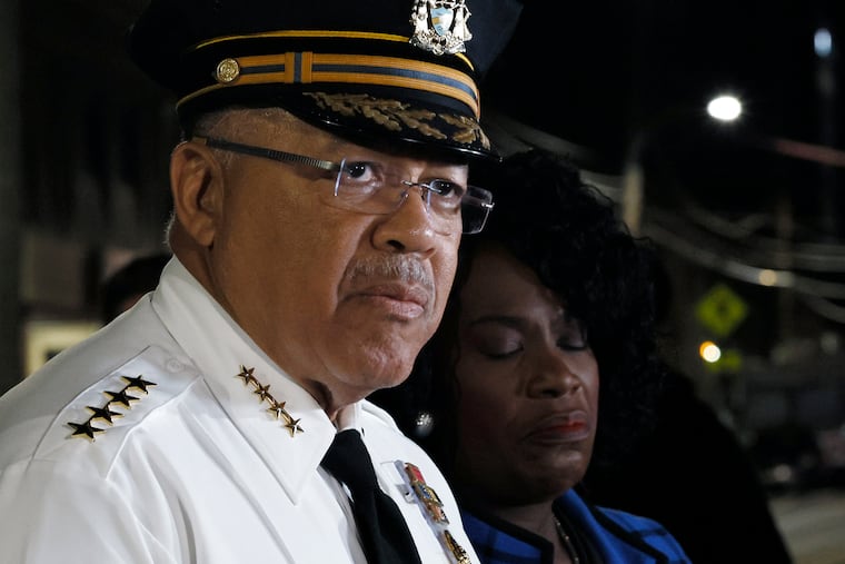 Philadelphia Police Commissioner Kevin Bethel and Mayor Cherelle L. Parker during an emotional news conference in front of Penn Presbyterian Medical Center.