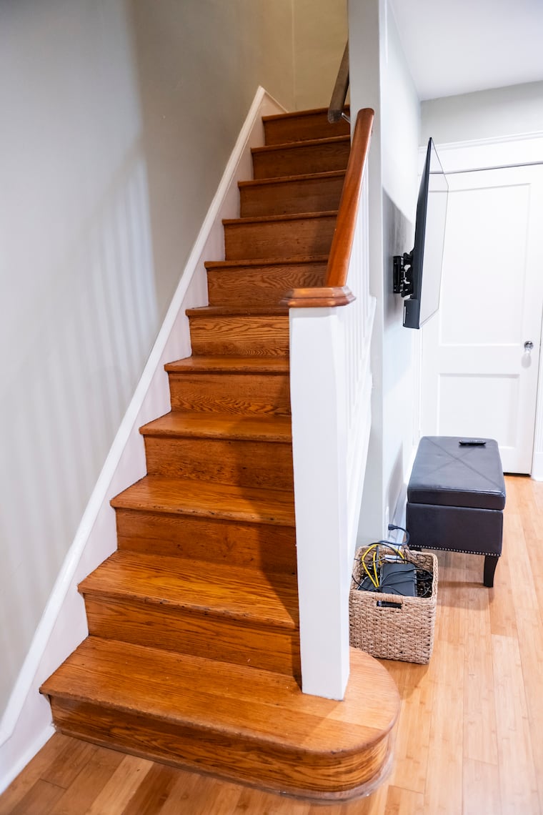 The home has an original wooden staircase. 