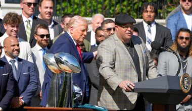 President Donald Trump allows the team's head of security Dom DiSandro to speak as he welcomes the Super Bowl champion Philadelphia Eagles NFL football team to the South Lawn of the White House, Monday, April 28, 2025, in Washington. (AP Photo/Mark Schiefelbein)