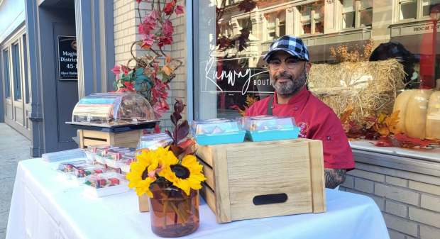 Juan Roman, of Runway Luxury Boutique, offers special treats on Saturday, Oct. 24, 2026, as part of Scranton's Fall Festival. (GERI GIBBONS/STAFF PHOTO)