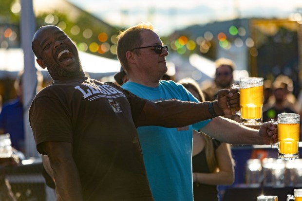 People competes in the stein-holding competition Saturday, Oct. 3, 2026, during Oktoberfest at SteelStacks in Bethlehem. The annual festival continues Oct. 9-11, 2026. (Mackenzie McGovern/Special to The Morning Call)