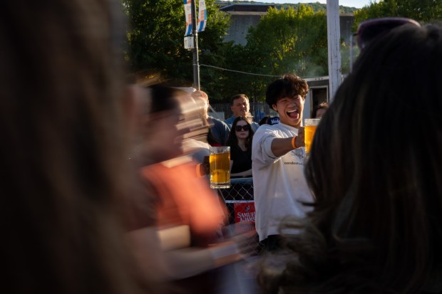 People competes in the stein-holding competition Saturday, Oct. 3, 2026, during Oktoberfest at SteelStacks in Bethlehem. The annual festival continues Oct. 9-11, 2026. (Mackenzie McGovern/Special to The Morning Call)