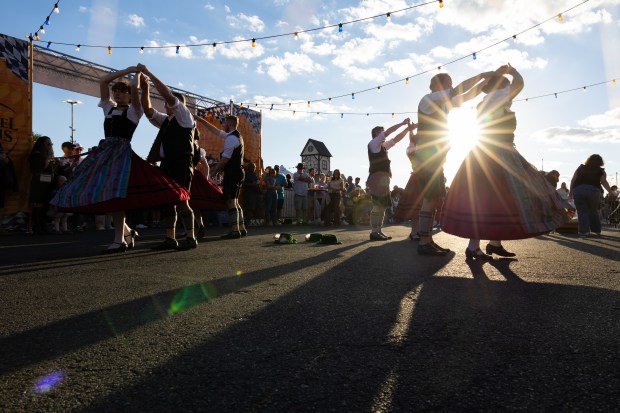 The group G.T.E.V. D'Lustigen Isartaler dances Saturday, Oct. 3, 2026, during Oktoberfest at SteelStacks in Bethlehem. The annual festival continues Oct. 9-11, 2026. (Mackenzie McGovern/Special to The Morning Call)
