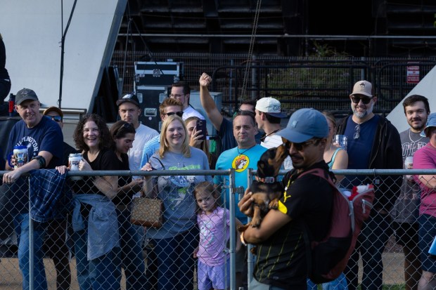 People enjoy the wiener dog races Saturday, Oct. 3, 2026, during Oktoberfest at SteelStacks in Bethlehem. The annual festival continues Oct. 9-11, 2026. (Mackenzie McGovern/Special to The Morning Call)