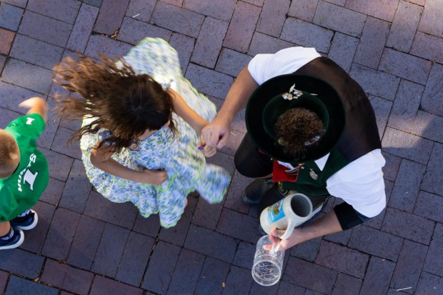 People enjoy the food, music and drinks Saturday, Oct. 3, 2026, during Oktoberfest at SteelStacks in Bethlehem. The annual festival continues Oct. 9-11, 2026. (Mackenzie McGovern/Special to The Morning Call)