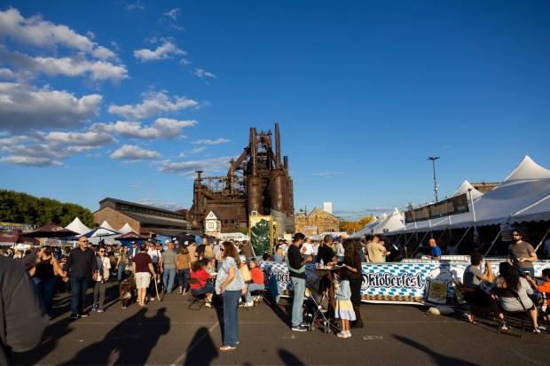 People enjoy the food, music and drinks Saturday, Oct. 3, 2026, during Oktoberfest at SteelStacks in Bethlehem. The annual festival continues Oct. 9-11, 2026. (Mackenzie McGovern/Special to The Morning Call)