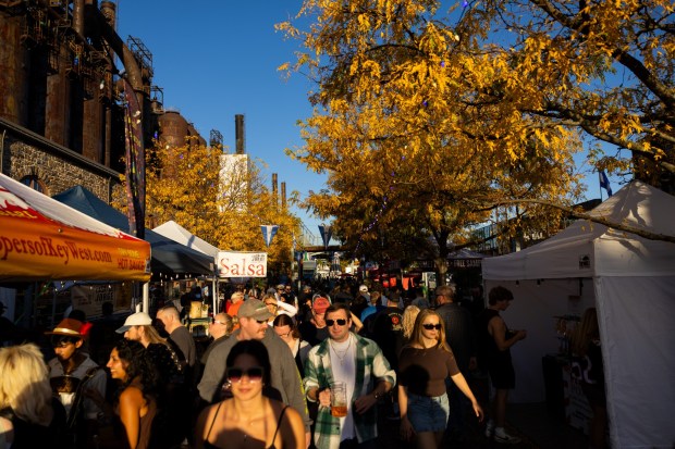 People enjoy the food, music and drinks Saturday, Oct. 3, 2026, during Oktoberfest at SteelStacks in Bethlehem. The annual festival continues Oct. 9-11, 2026. (Mackenzie McGovern/Special to The Morning Call)
