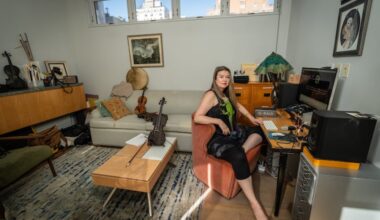 Lara St. John, in her home office/editing suite where she worked on her documentary film, "Dear Lara," with her pet iguana, Octavius, in New York City on Sept. 10, 2024.
