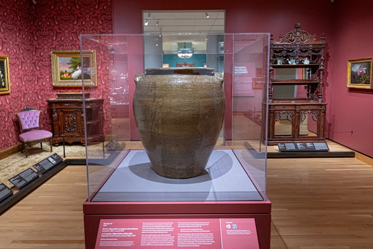 A monumental jar made and inscribed by enslaved potter David Drake, also known as Dave, is displayed in the A Nation of Artists exhibition at the Philadelphia Museum of Art in Philadelphia on Thursday, Oct. 8, 2026.