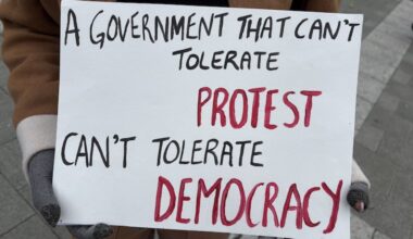 A demonstrator holds up a sign at a protest on Saturday, Oct. 17, 2026, at the Philadelphia Art Museum steps, decrying election manipulation in India.
